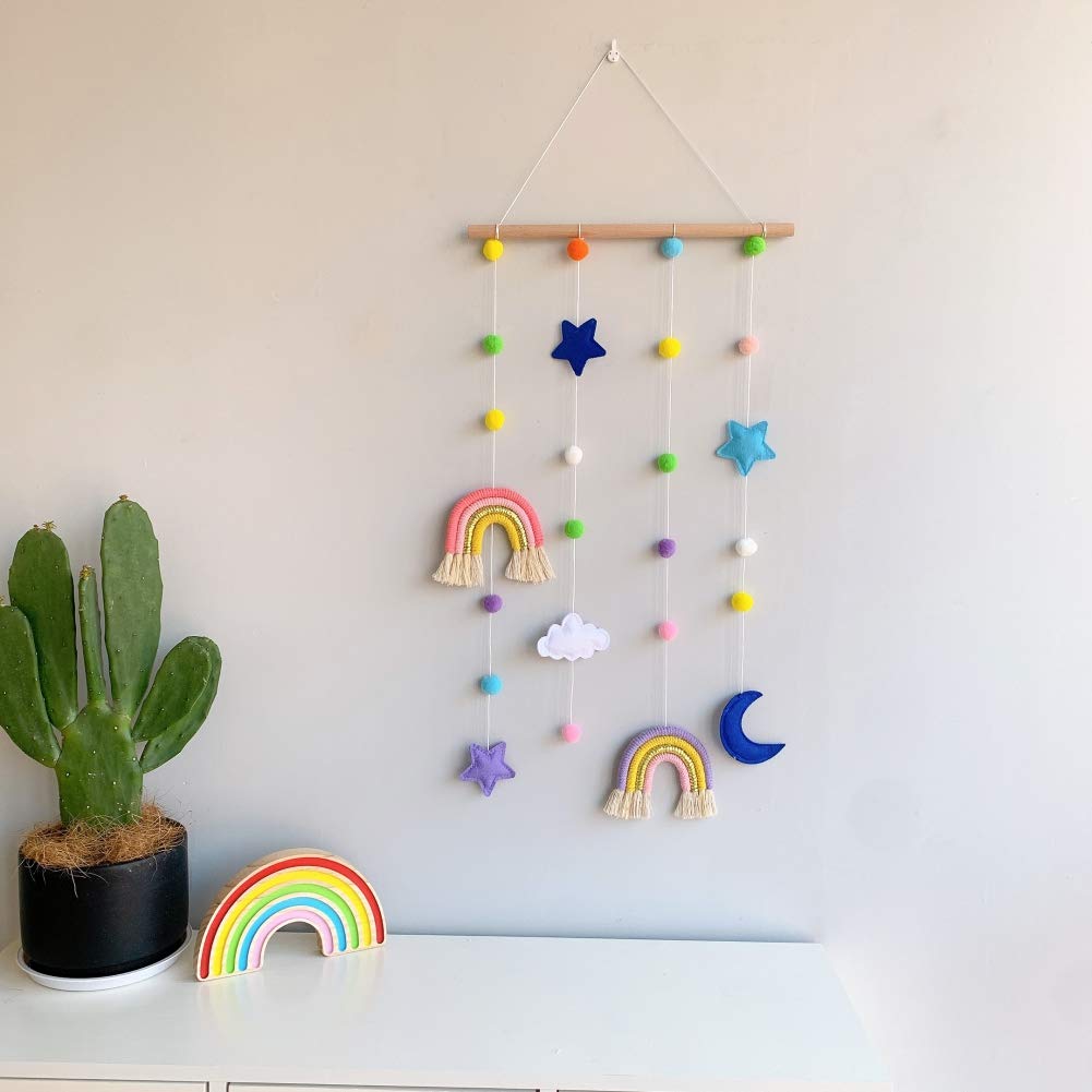 Macrame Rainbow Wall Hanging for Nursery Room,URMAGIC Rainbow Hanging Photo Display with Pom Pom Ball and 25 Photo Clips,Wood Mobile Bed Bell with Moon,Cloud and Stars,Baby Crib Hanging Toys