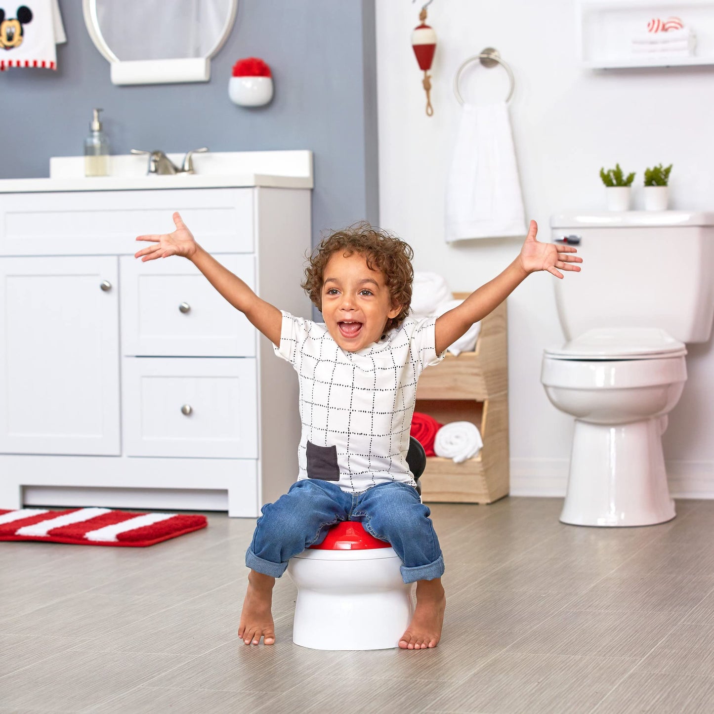 The First Years Disney Minnie Mouse Potty Training Toilet and Toddler Toilet Seat - Toilet Training Potty with Fun Flushing and Cheering Sounds,Pink