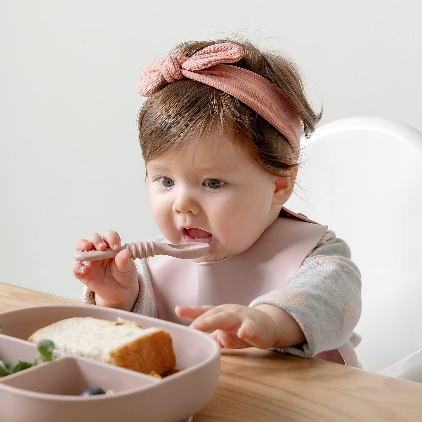 SAMiGO Silicone Baby Utensils - Self Feeding Spoons and Tiny Training Cup - First Stage Baby Led Weaning Supplies for 6 Months+ Infants - Set of 3