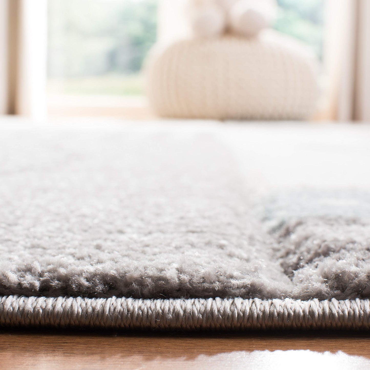 SAFAVIEH Carousel Kids Collection Area Rug - 5'3" Round, Grey & Ivory, Animal Design, Non-Shedding & Easy Care, Ideal for High Traffic Areas for Boys & Girls in Playroom, Nursery, Bedroom (CRK188B)