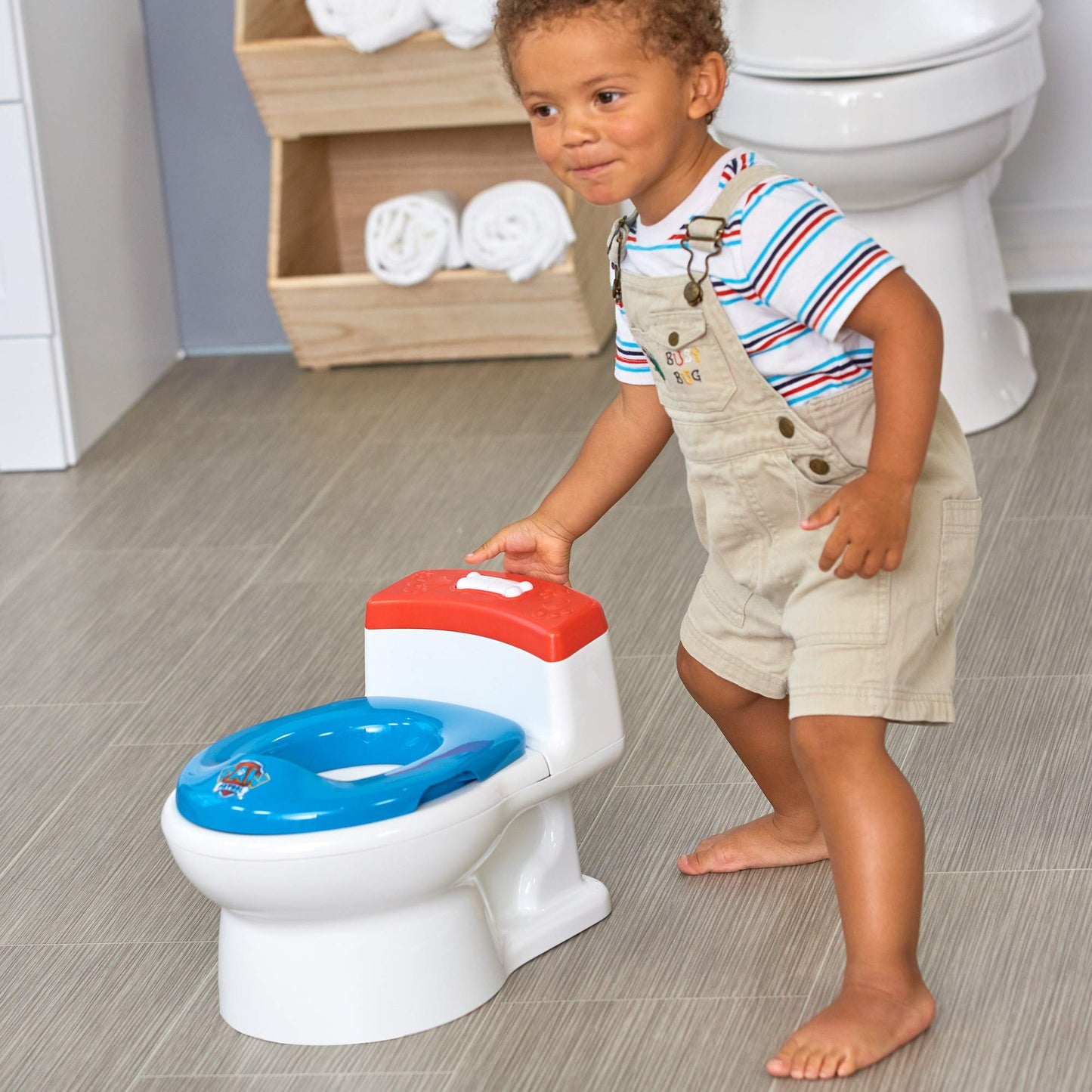The First Years Disney Minnie Mouse Potty Training Toilet and Toddler Toilet Seat - Toilet Training Potty with Fun Flushing and Cheering Sounds,Pink