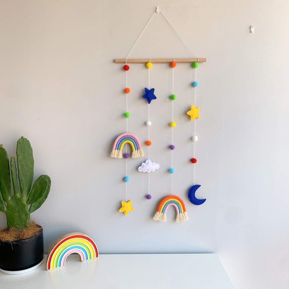 Macrame Rainbow Wall Hanging for Nursery Room,URMAGIC Rainbow Hanging Photo Display with Pom Pom Ball and 25 Photo Clips,Wood Mobile Bed Bell with Moon,Cloud and Stars,Baby Crib Hanging Toys