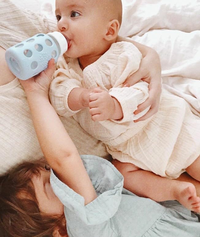 Lifefactory Glass Baby Bottles with Silicone Protection - 2-PACK, 4 Ounce Bottles, Pink & Sky Blue