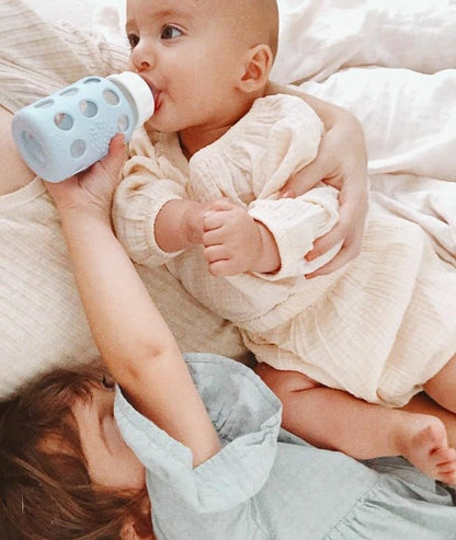 Lifefactory Glass Baby Bottles with Silicone Protection - 2-PACK, 4 Ounce Bottles, Pink & Sky Blue