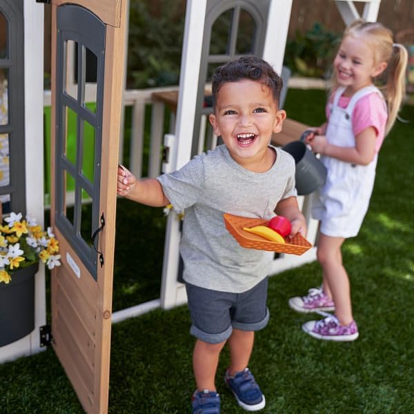KidKraft Lantana Lane Outdoor Wooden Playhouse with Kitchen and Flap Door