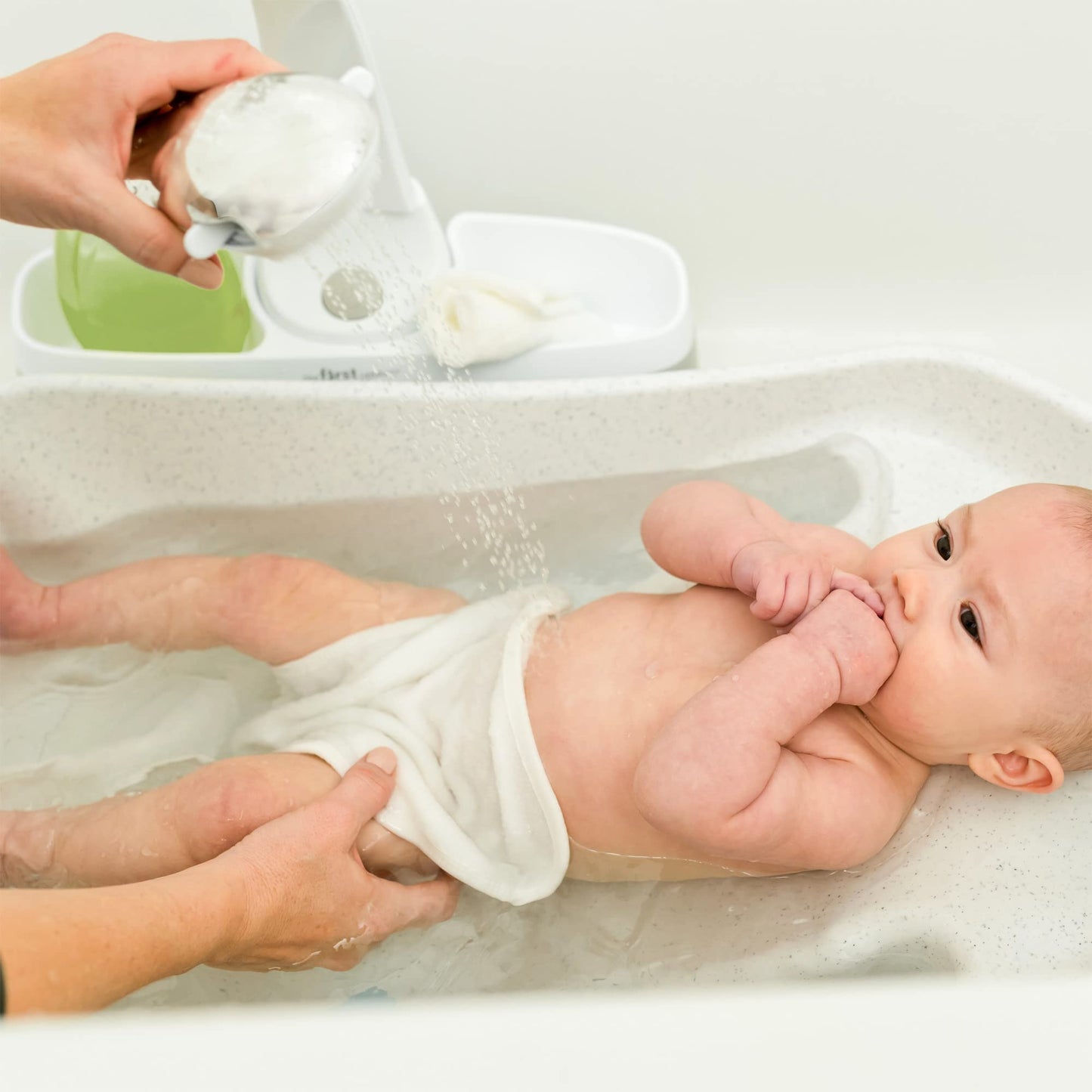 The First Years Rain Shower Baby Bath Tub Set - Includes Convertible Bath Tub and Sling with Soothing Spray - Baby Bath Seat and Spa for Newborn to Toddler - Baby Bath Essentials