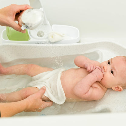 The First Years Rain Shower Baby Bath Tub Set - Includes Convertible Bath Tub and Sling with Soothing Spray - Baby Bath Seat and Spa for Newborn to Toddler - Baby Bath Essentials