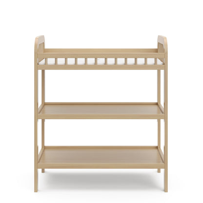 Storkcraft Pasadena Changing Table with Water-Resistant Changing Pad (Driftwood) - GREENGUARD Gold Certified, Includes Bonus Water-Resistant Changing Pad with Safety Strap, 2 Open Shelves