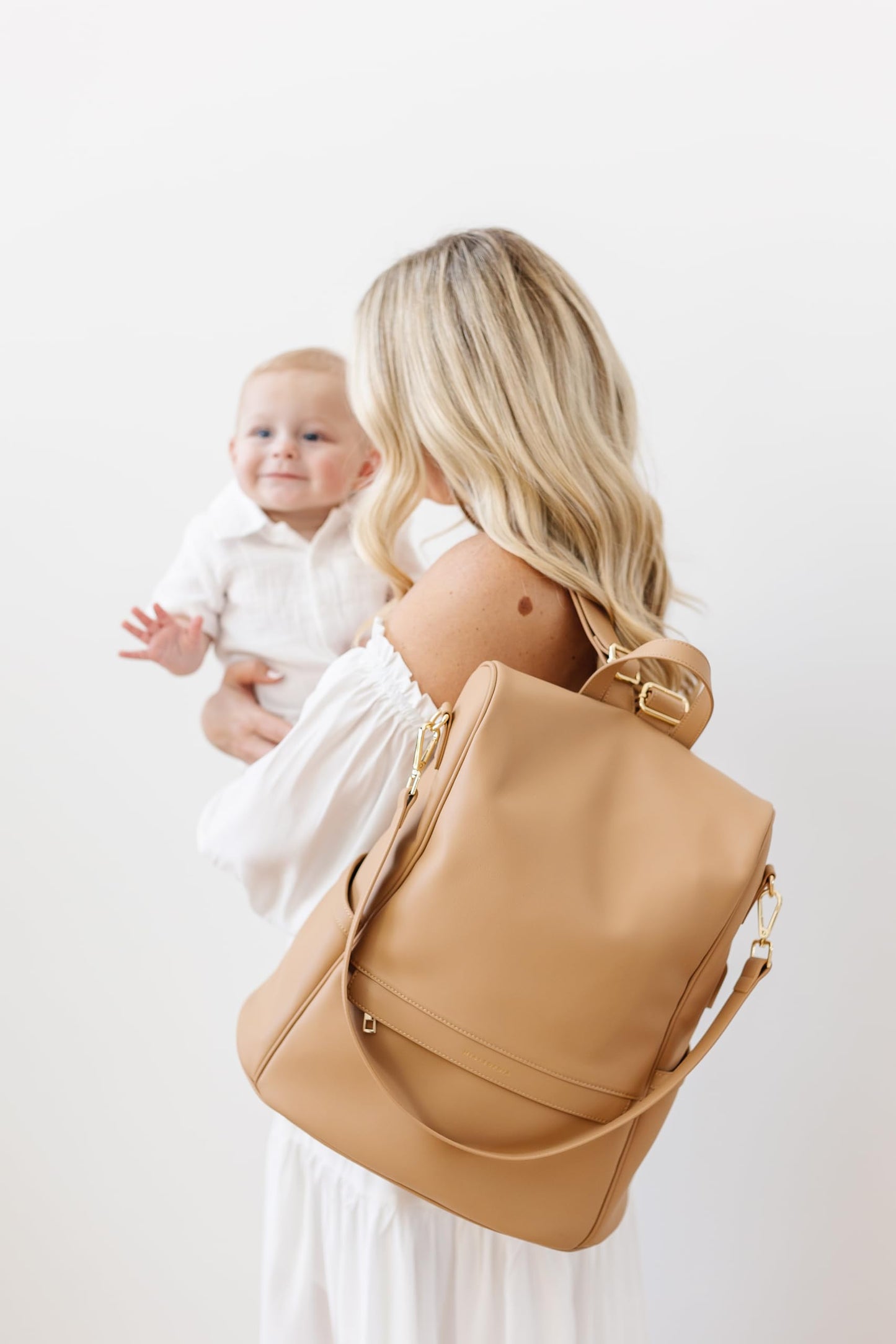 Leather Diaper Bag Backpack with USB Charging port, Changing Pad, Stroller Straps, and Bottle Holder (Brown Olivia)
