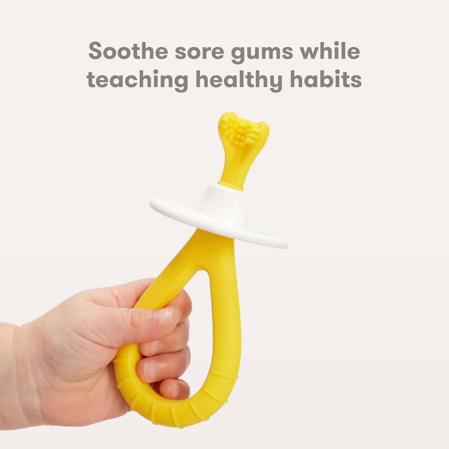 Frida Baby Grow-with-Me Baby Toothbrush Training Set | Infant to Toddler Toothbrush 0-12 months, Cleans All Sides at Once, Oral Care for Sensitive Gums | Yellow