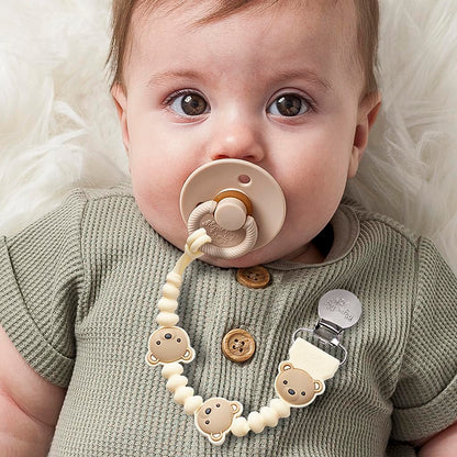 Itzy Ritzy Silicone Pacifier Clip; 100% Food Grade Silicone Pacifier Strap with Clip Keeps Pacifiers, Teethers & Small Toys in Place; Features One-Piece Design, Bear Character & Silicone Cord (Bear)