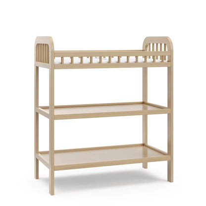 Storkcraft Pasadena Changing Table with Water-Resistant Changing Pad (Driftwood) - GREENGUARD Gold Certified, Includes Bonus Water-Resistant Changing Pad with Safety Strap, 2 Open Shelves