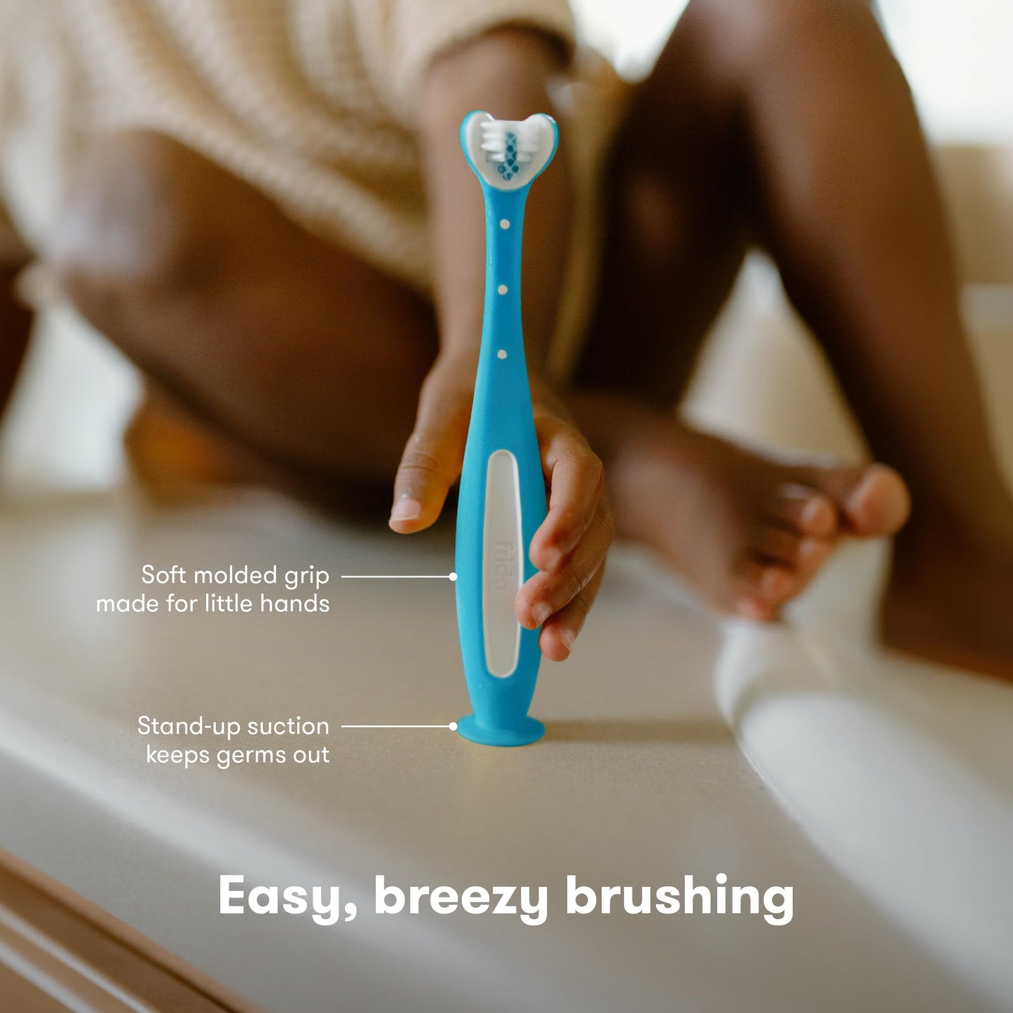 Frida Baby Triple-Angle Toothhugger Training Toddler Toothbrush | Toddler Toothbrush 2 Years and Up, Cleans All Sides at Once | Pink