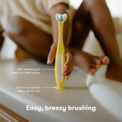 Frida Baby Triple-Angle Toothhugger Training Toddler Toothbrush | Toddler Toothbrush 2 Years and Up, Cleans All Sides at Once | Pink