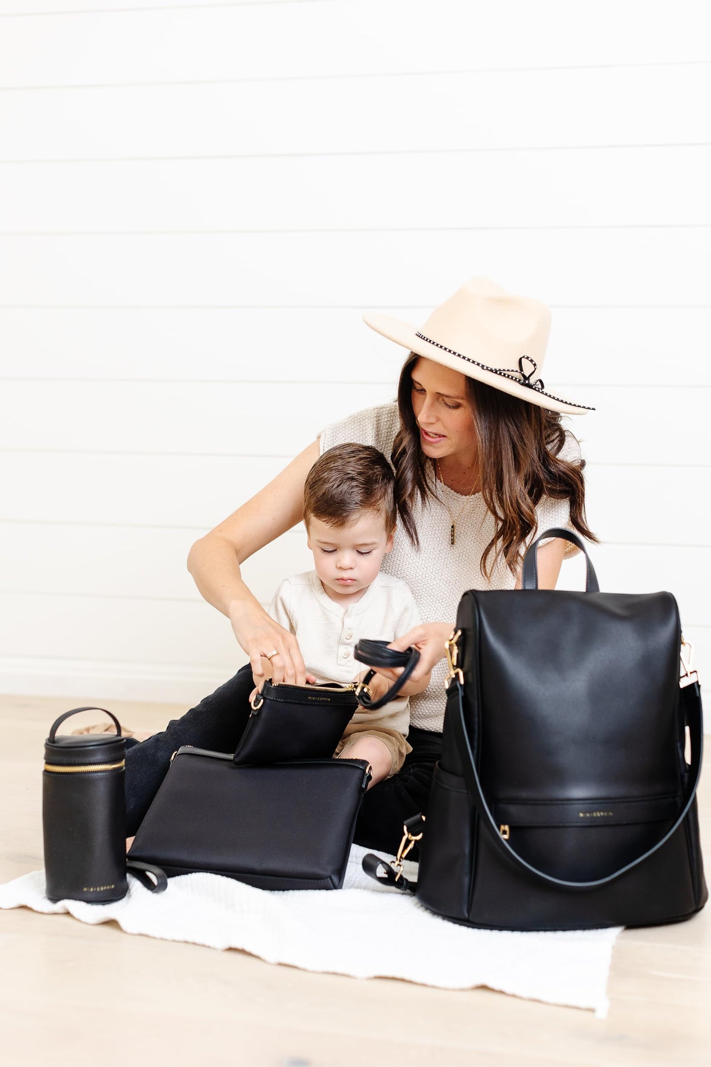 Leather Diaper Bag Backpack with USB Charging port, Changing Pad, Stroller Straps, and Bottle Holder (Brown Olivia)