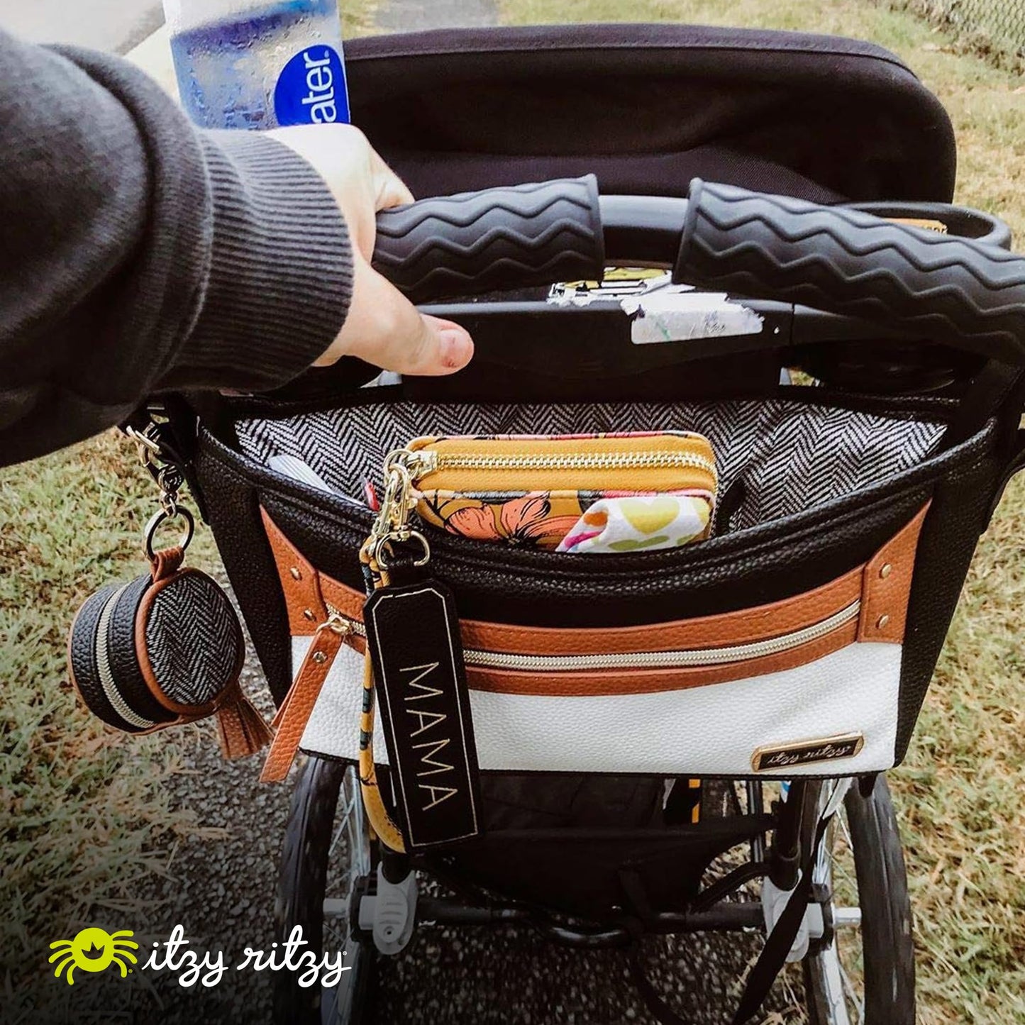 Itzy Ritzy Adjustable Stroller Caddy and Organizer Bag Featuring Front Zippered Pocket, 2 Built-in Interior Pockets & Adjustable Straps to Fit Nearly Any Stroller (Chai)