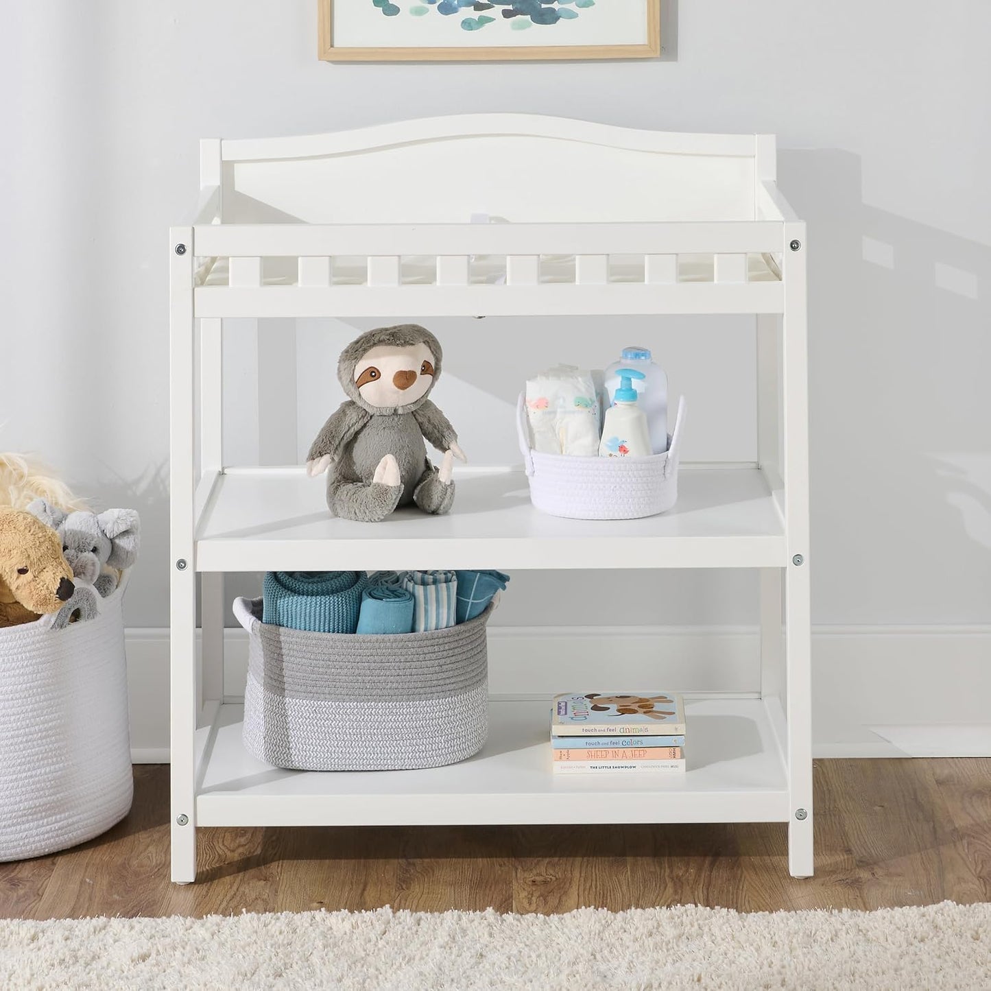 Badger Basket Baby Changing Table with Pad & Shelves - Wooden Changing Table with Storage - Nursery Change Table for Diapers & Baby Essentials, White