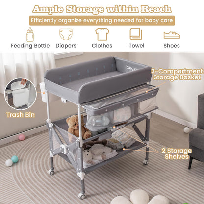 BABY JOY Portable Baby Changing Table, Foldable Waterproof Diaper Changing Station w/Wheels, Adjustable Height, Storage Basket, Shelves & Trash Bin, Mobile Nursery Organizer for Newborn Infant, Beige