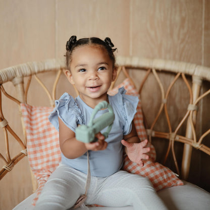 mushie Silicone Baby Daisy Rattle Teether Toy (Dusty Rose)