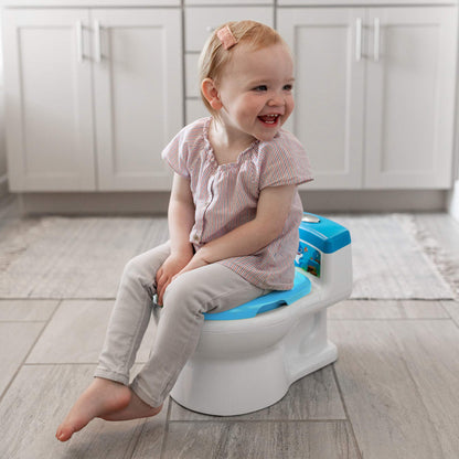 The First Years Disney Minnie Mouse Potty Training Toilet and Toddler Toilet Seat - Toilet Training Potty with Fun Flushing and Cheering Sounds,Pink