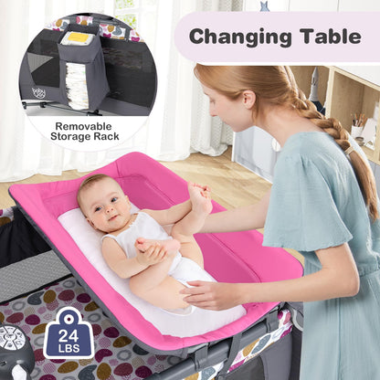 BABY JOY 5 in 1 Pack and Play, Portable Baby Playard w/Bassinet & Diaper Changing Table, Infant Pink Bassinet Crib with Toys & Music & Oxford Bag for Baby Girl Toddlers (Pink + Purple, Starry Sky)