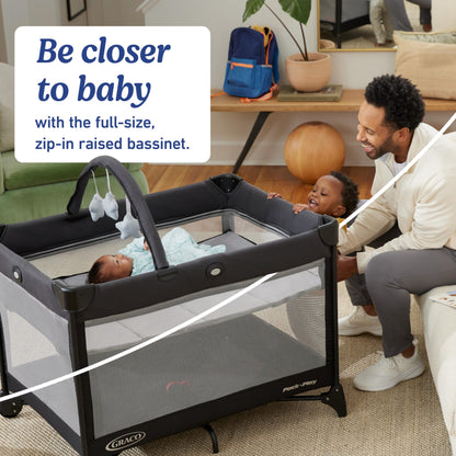 Graco On The Go Zip Pack ‘n Play Playard, Folding Playpen with Bassinet, Portable Crib, Reeves