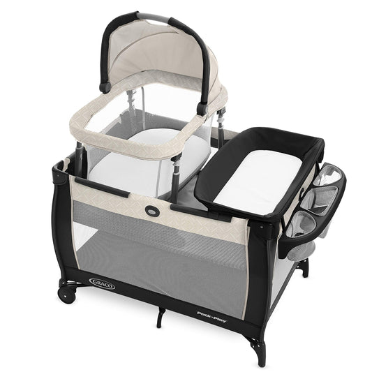 Graco On The Go Zip Pack ‘n Play Playard, Folding Playpen with Bassinet, Portable Crib, Reeves