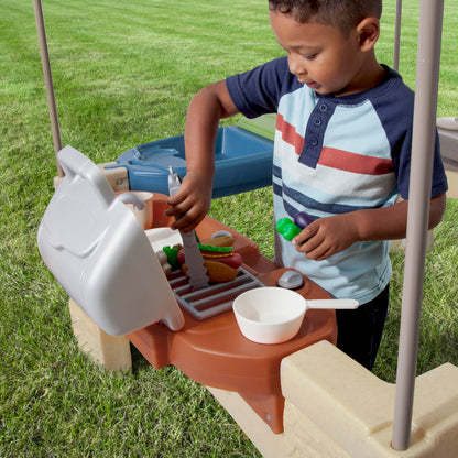 Step2 All Around Playtime Patio with Canopy, Kids Indoor/Outdoor Kitchen Playset & Sensory Playhouse, Made of Durable Plastic, Includes 16 Piece Toy Accessories, For Toddlers 2+ Years Old, Green