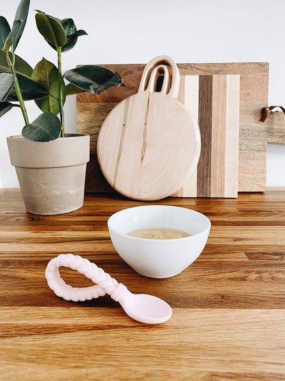 Itzy Ritzy Silicone Spoon & Fork Set; Baby Utensils Featuring a Baby Fork and Spoon with Looped, Braided Handles - Made of 100% Food Grade Silicone & BPA-Free - Ages 6 Months and Up (Pink)