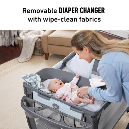 Graco On The Go Zip Pack ‘n Play Playard, Folding Playpen with Bassinet, Portable Crib, Reeves