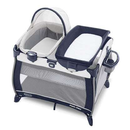 Graco On The Go Zip Pack ‘n Play Playard, Folding Playpen with Bassinet, Portable Crib, Reeves