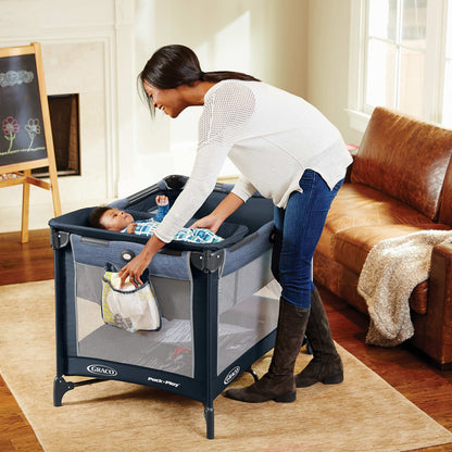 Graco On The Go Zip Pack ‘n Play Playard, Folding Playpen with Bassinet, Portable Crib, Reeves